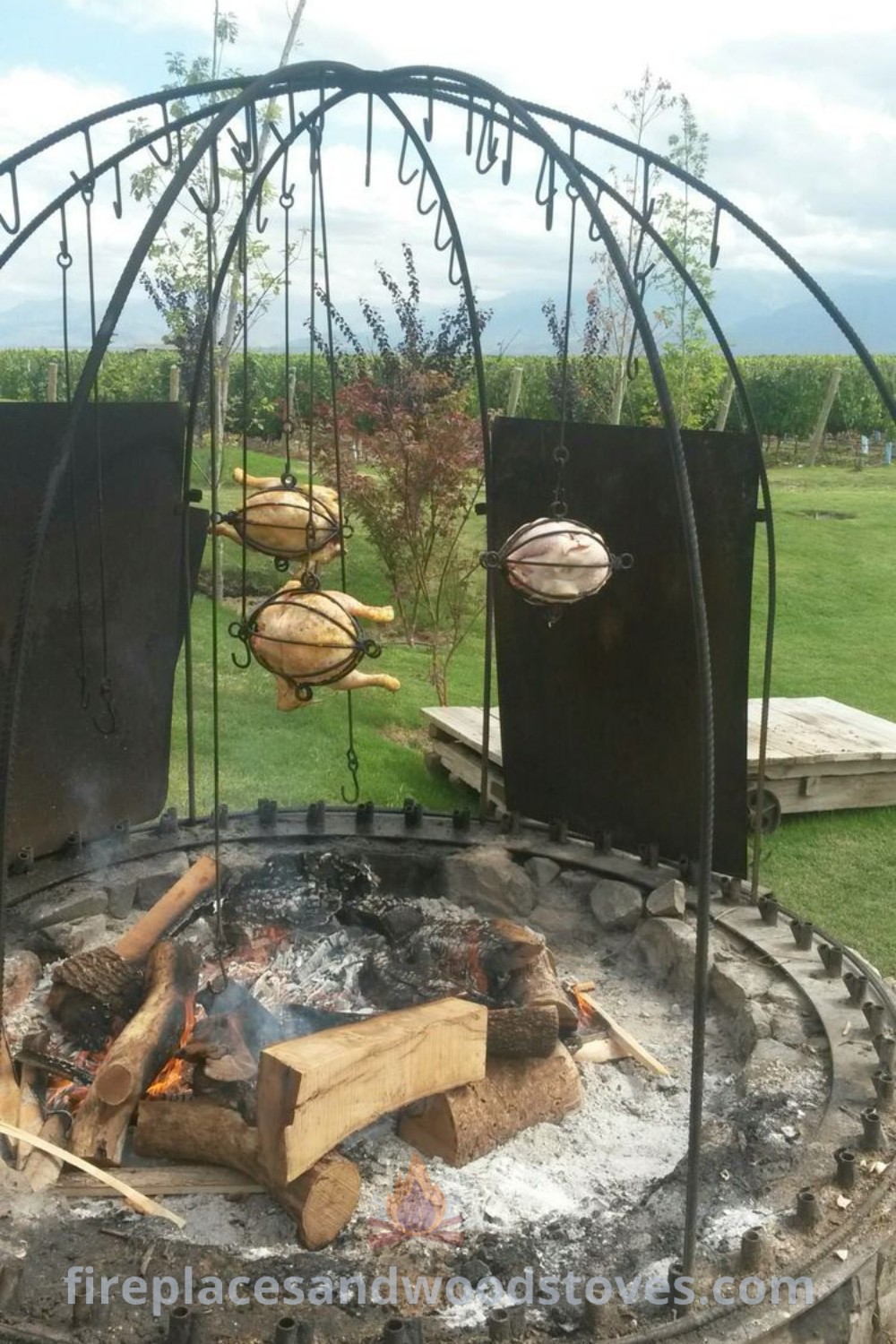 An outdoor fire pit with grills, designed for stylish outdoor cooking and cozy gatherings, ideal for fire food enthusiasts. Discover incredible outdoor ideas at patioandhomefurniture.com.