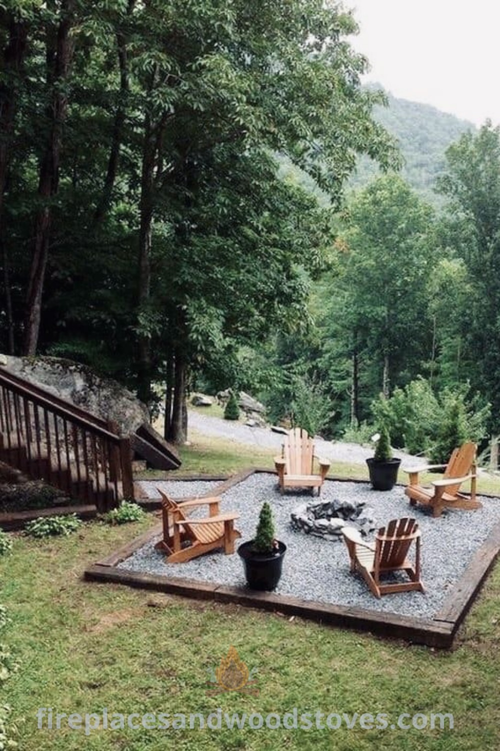 An outdoor fire pit surrounded by lawn chairs and trees, featuring steps leading up to it, offering budget-friendly ideas for a stylish backyard deck and fire pit landscaping. Find more inspiration for your outdoor space at patioandhomefurniture.com.