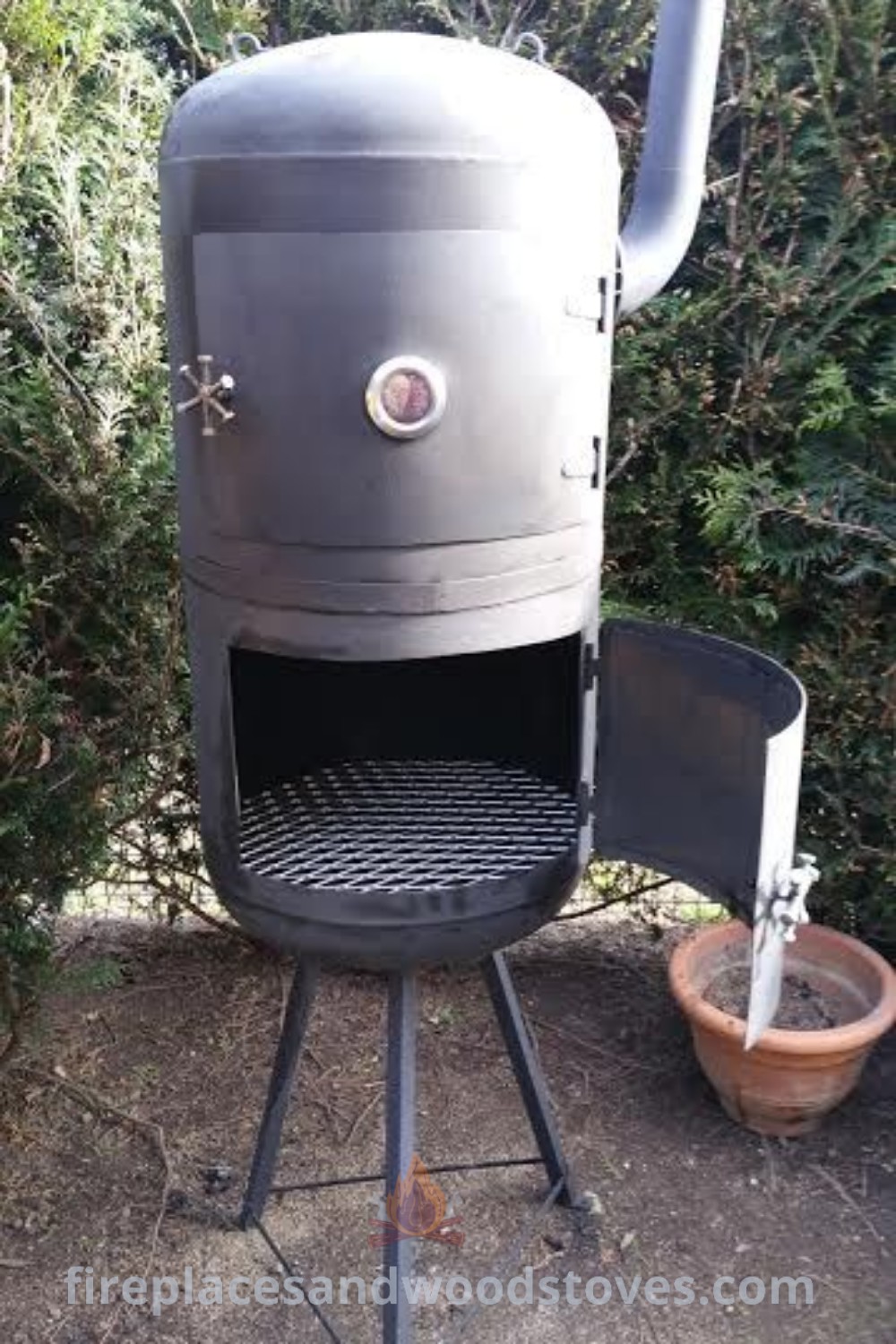 An outdoor charcoal smoker surrounded by bushes, paired with creative decor ideas like a pergola fire pit and wood-burning heaters for a stylish backyard ambiance. Explore amazing outdoor inspirations at patioandhomefurniture.com.