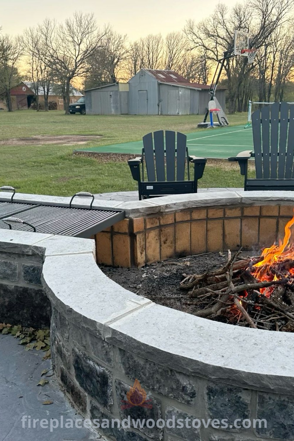 An outdoor keyhole fire pit with surrounding chairs, ideal for creating a cozy atmosphere for backyard gatherings and campfires. Discover stylish designs transforming your outdoor space at patioandhomefurniture.com.