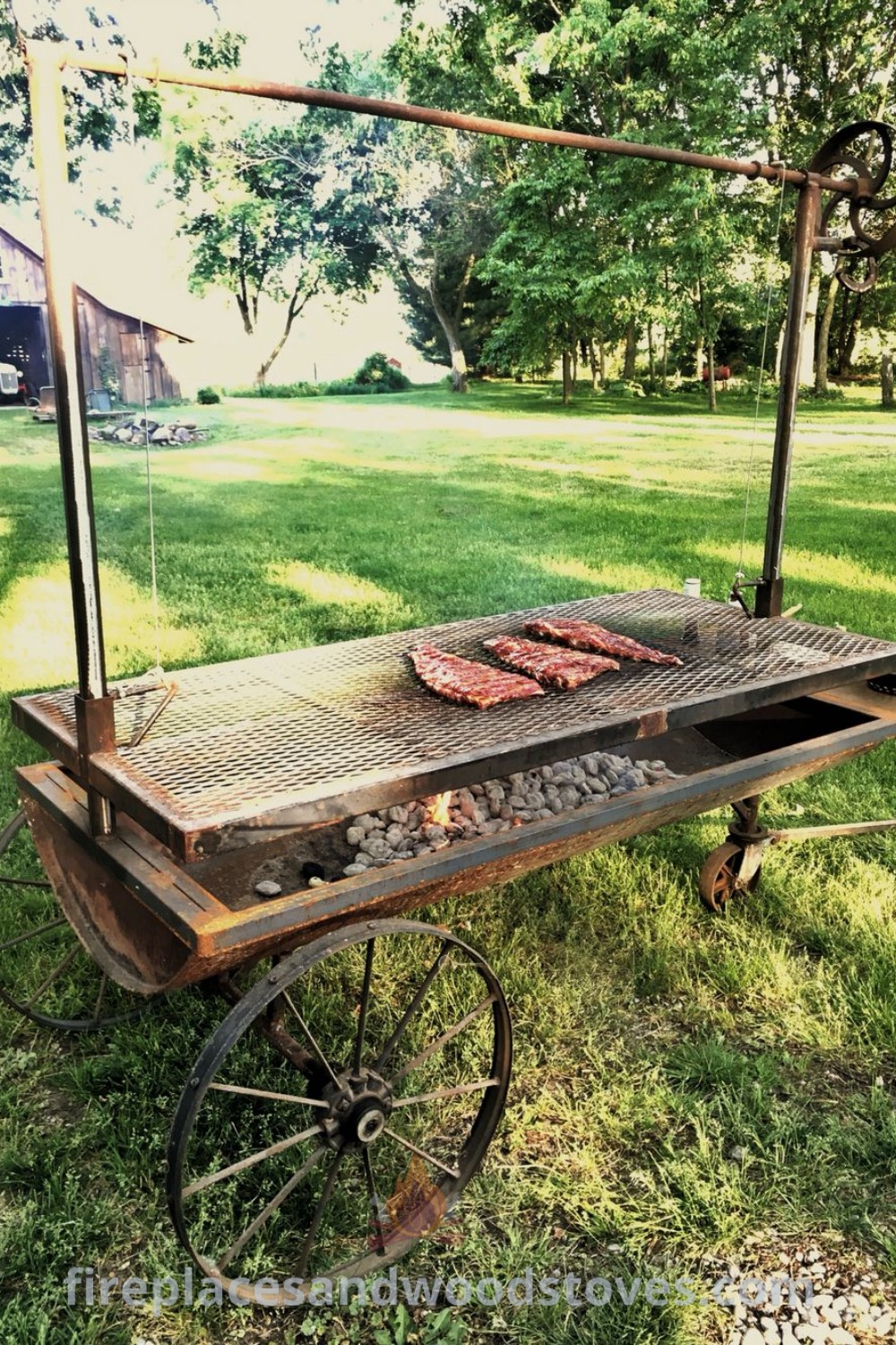 An old-fashioned charcoal grill sitting in the grass, providing stylish outdoor cooking ideas and enhancing the cozy atmosphere of your backyard. Discover more inspiration for your outdoor spaces at patioandhomefurniture.com.