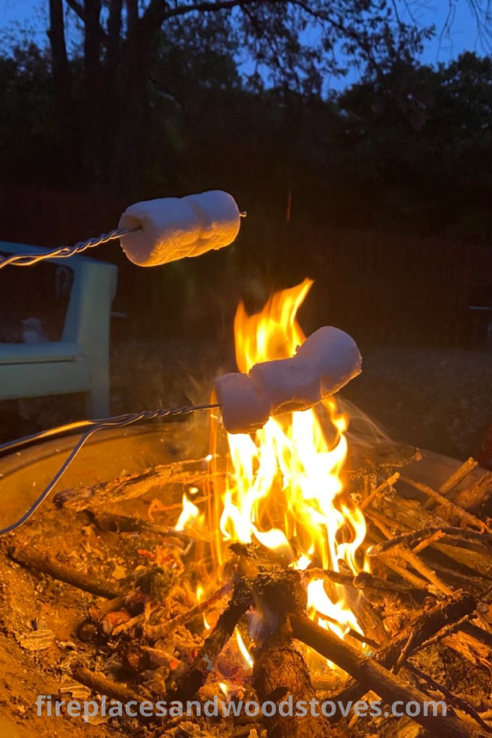 Marshmallows roasting over an open fire pit, perfect for campfire smores and gatherings. This cozy setup offers incredible ideas for outdoor fun, transforming your backyard into a stylish retreat for memorable experiences. Find more inspiration at patioandhomefurniture.com.