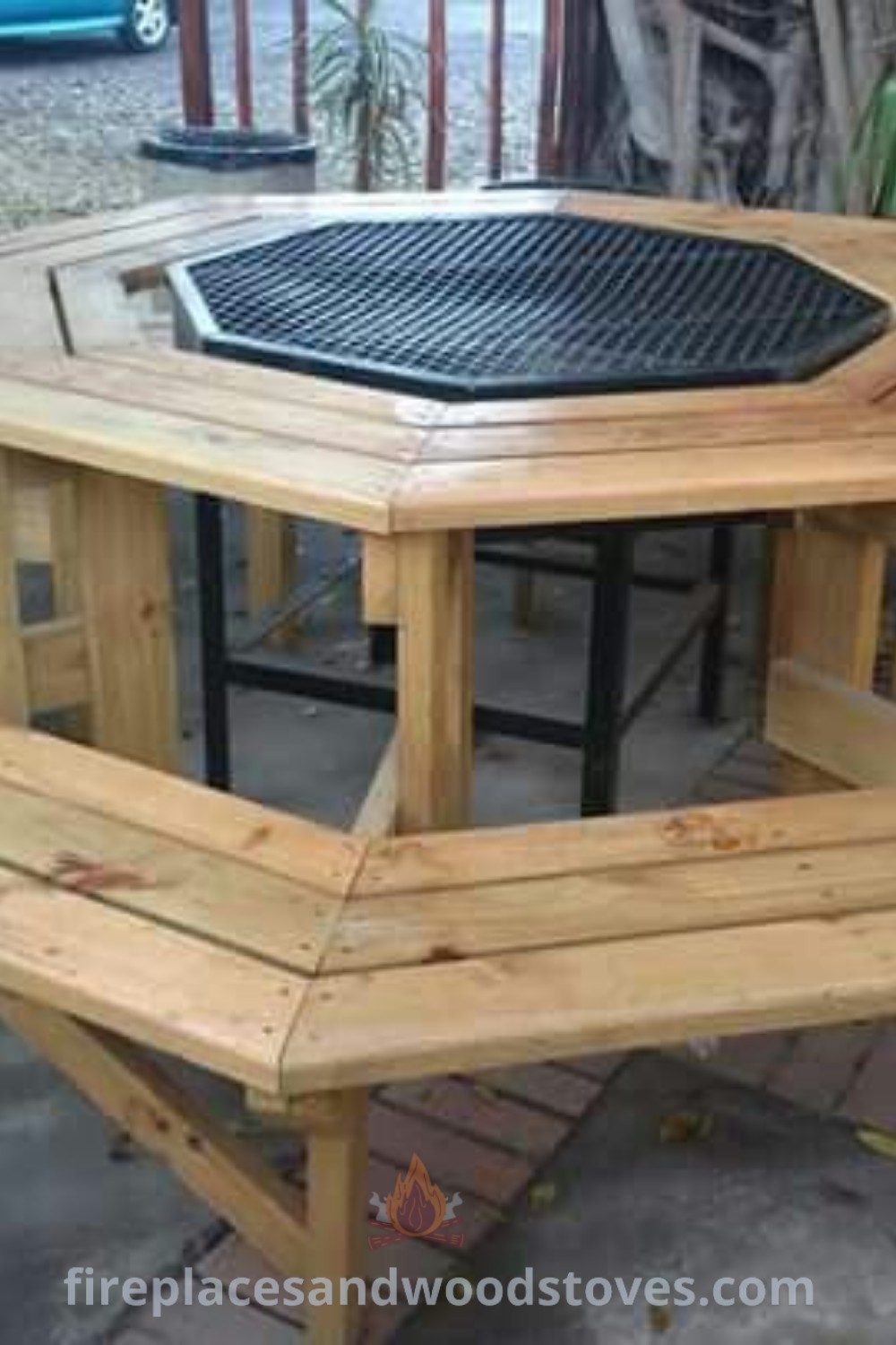 An outdoor wooden pallet BBQ grill table surrounded by benches, featuring a cozy fire pit setup for gatherings. Discover stylish outdoor designs and grilling ideas at patioandhomefurniture.com.