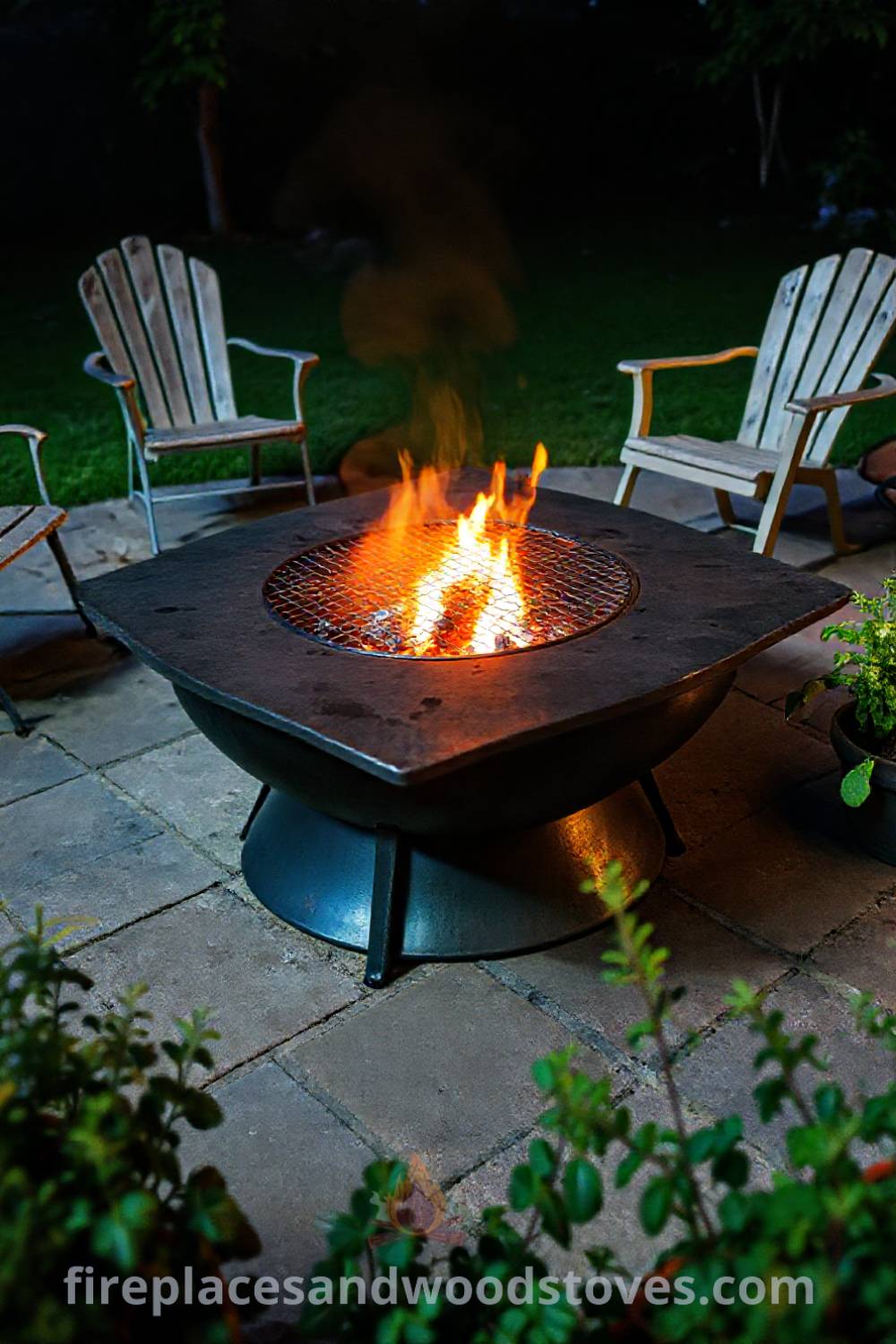 Sturdy metal charcoal-burning fire pit on a patio surrounded by mismatched chairs and potted herbs, creating a cozy outdoor atmosphere perfect for gatherings. Visit patioandhomefurniture.com for stylish designs transforming your backyard into a dream gathering space.