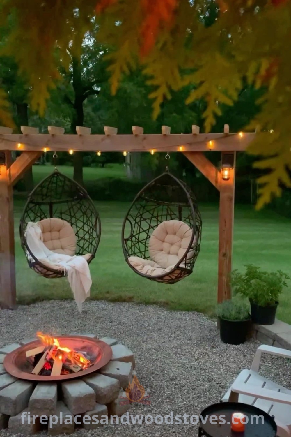 An outdoor sand fire pit with two hanging chairs, enhancing the backyard decor and making it a cozy retreat for gatherings. Discover incredible backyard renovation ideas and stylish designs at patioandhomefurniture.com.