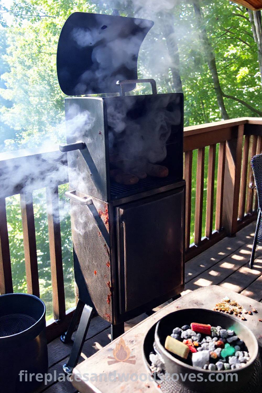 Vertical smoker barbecue on a wooden deck, with slow-cooked meats sending wafts of smoke into the air, surrounded by herbs and spices, creating a warm and inviting outdoor space. Visit patioandhomefurniture.com for incredible ideas that will wow your guests.
