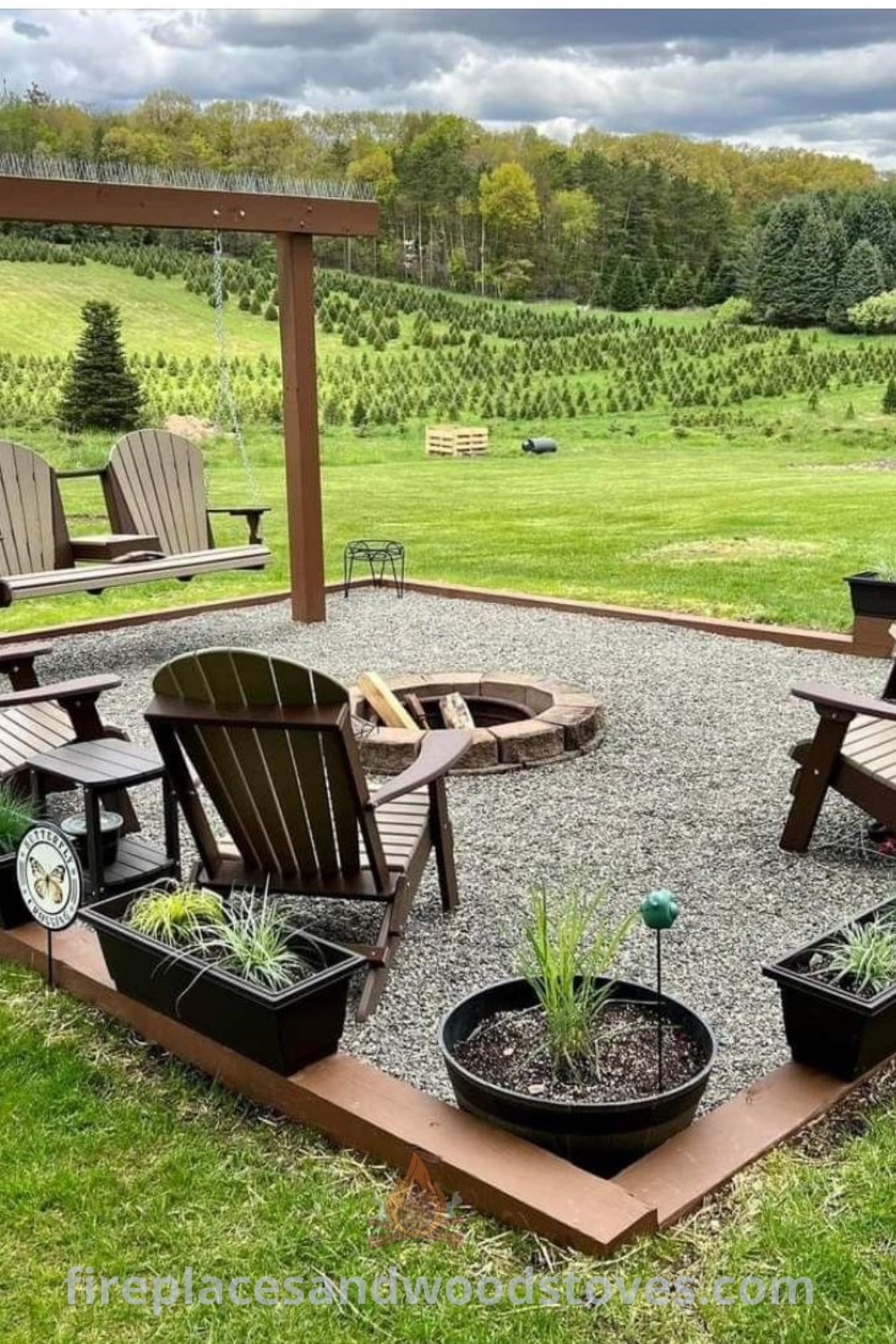 An outdoor patio with chairs and potted plants, showcasing stylish ranch outdoor patio ideas and cozy settings for relaxation. Explore creative designs and outdoor inspirations at patioandhomefurniture.com.