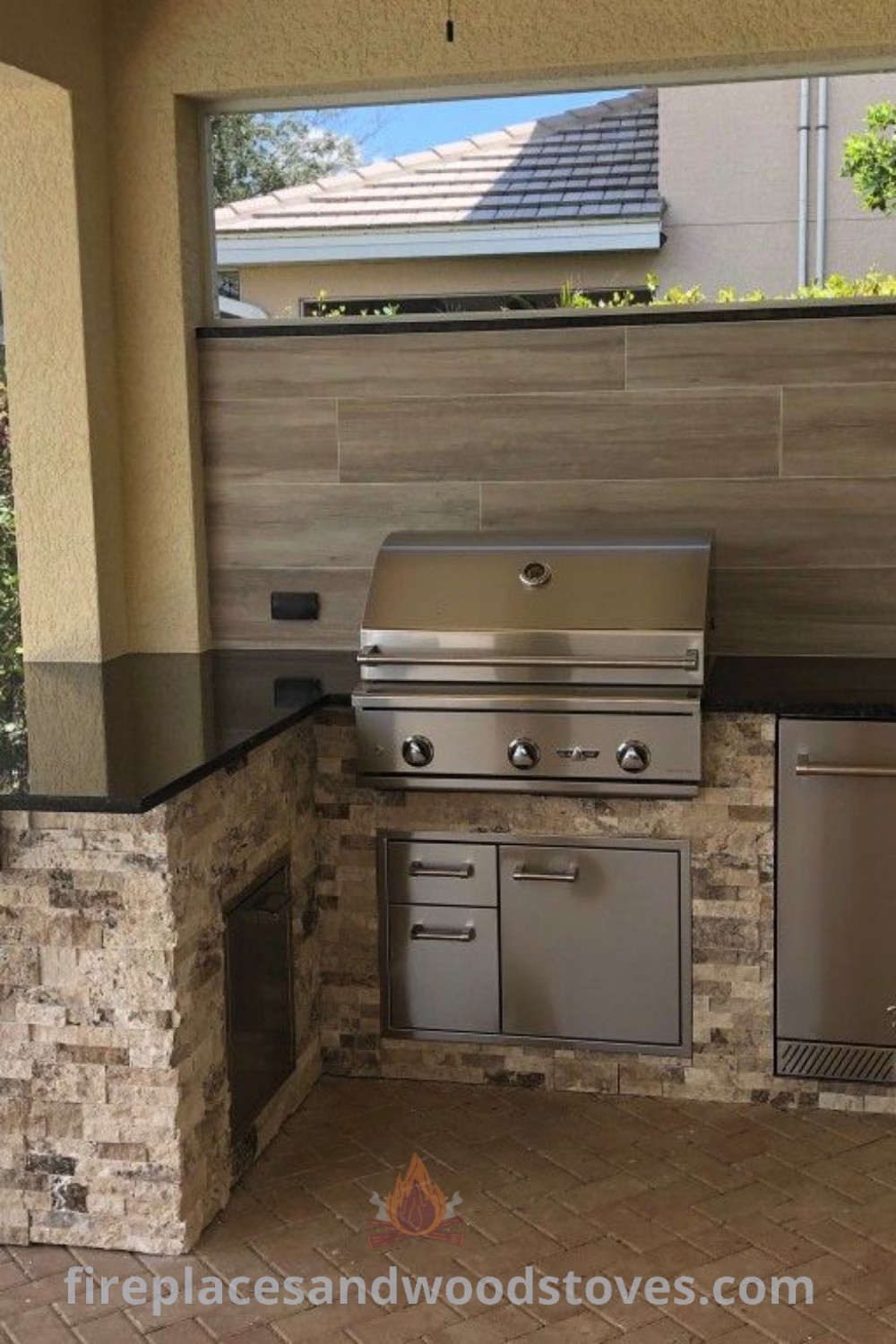 An outdoor kitchen featuring stainless steel appliances and granite countertops, ideal for small outdoor kitchens and patio grill setups. This stylish design provides incredible ideas for outdoor living, perfect for entertaining. Discover more inspiration at patioandhomefurniture.com.