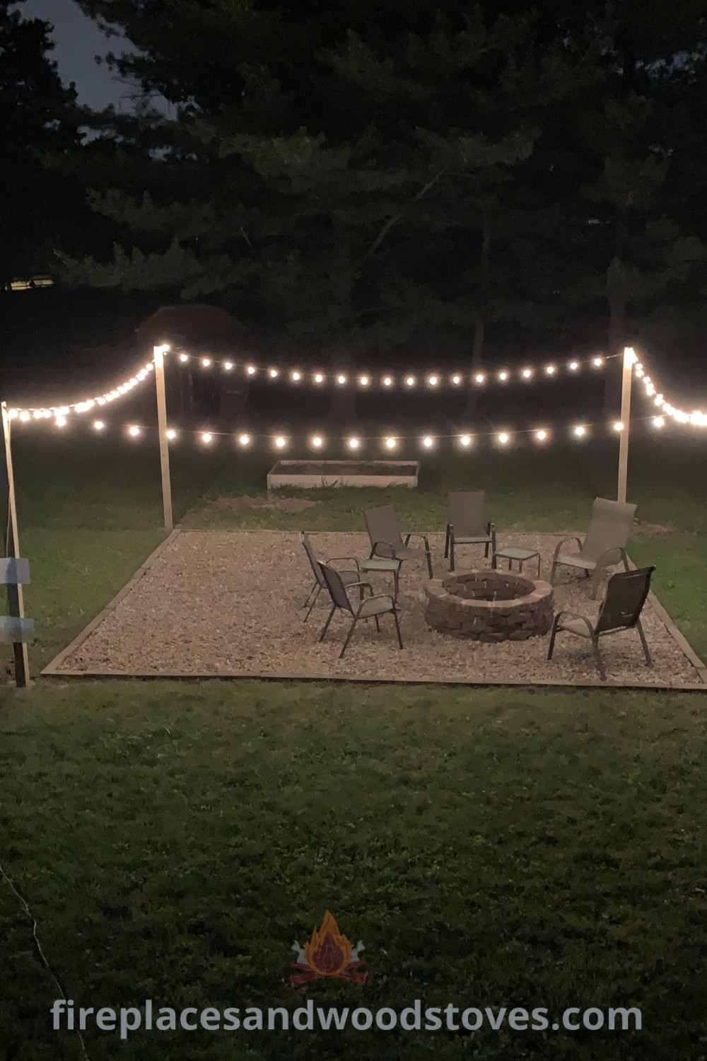 An outdoor fire pit surrounded by string lights, creating a cozy backyard oasis ideal for game areas and campground-inspired hangouts. Discover more stylish backyard ideas at patioandhomefurniture.com.