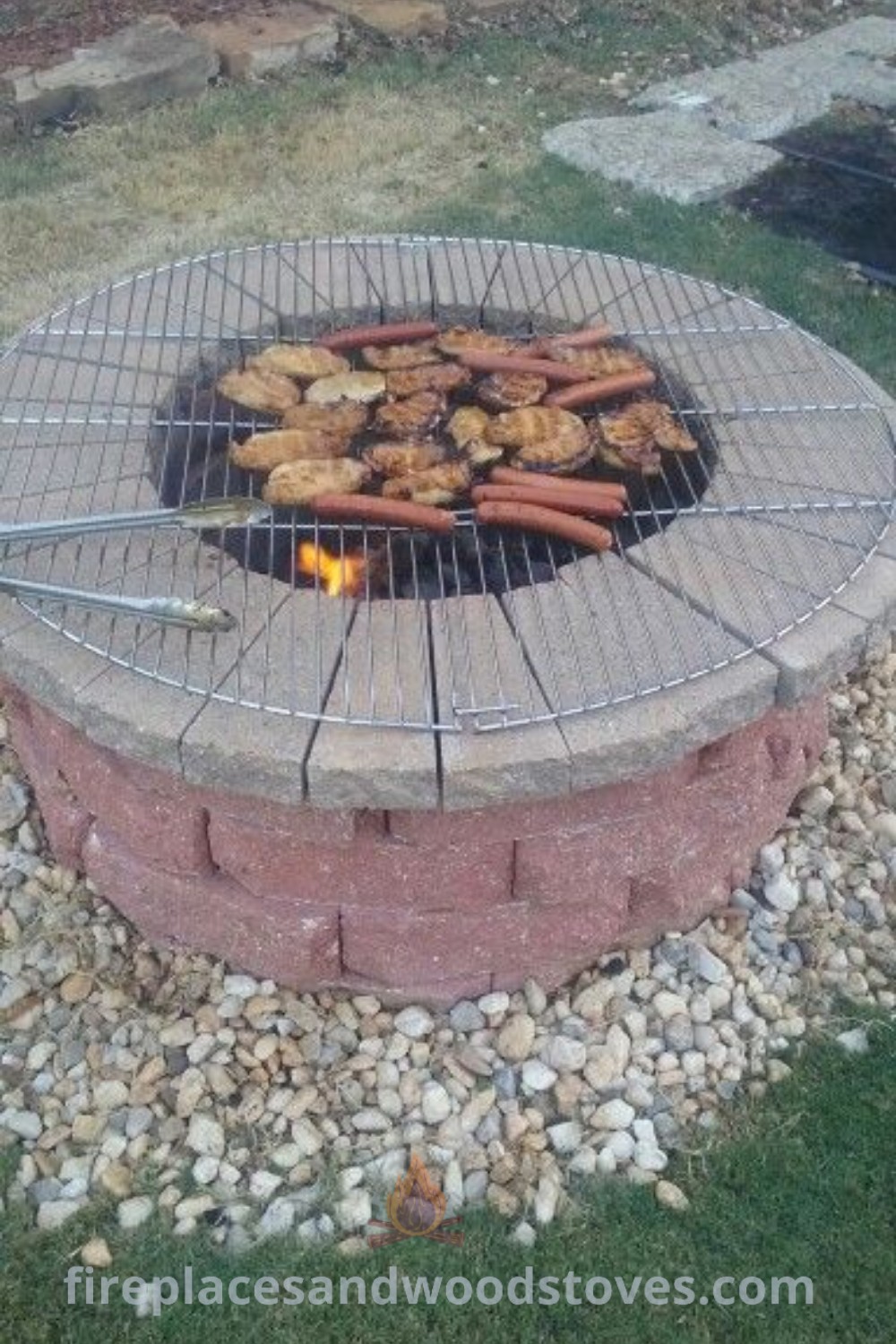 A grill with hot dogs on a cinder block fire pit surrounded by rocks and grass, showcasing a cozy outdoor seating area. Discover stylish fire pit designs and incredible backyard ideas at patioandhomefurniture.com.