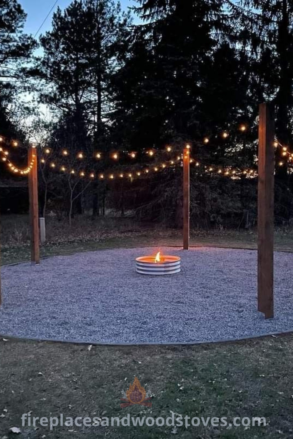 An outdoor fire pit area surrounded by string lights and trees, showcasing backyard lighting and DIY landscaping ideas. Create a cozy and stylish atmosphere for gatherings. Discover more inspiration at patioandhomefurniture.com.