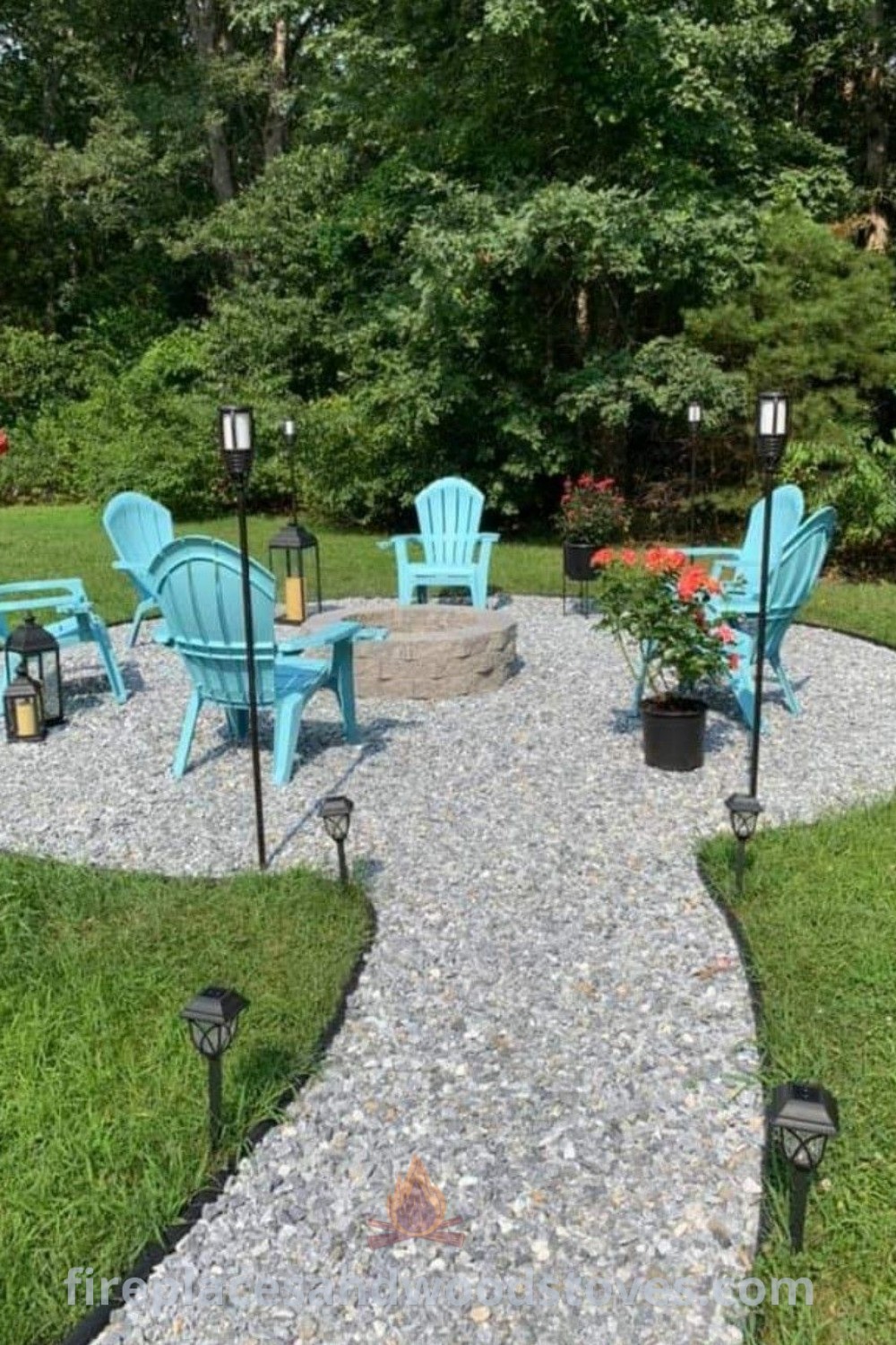 A stylish round gravel fire pit area surrounded by chairs, rocks, and plants, ideal for creating a cozy outdoor space. Discover incredible DIY ideas for your backyard at patioandhomefurniture.com.