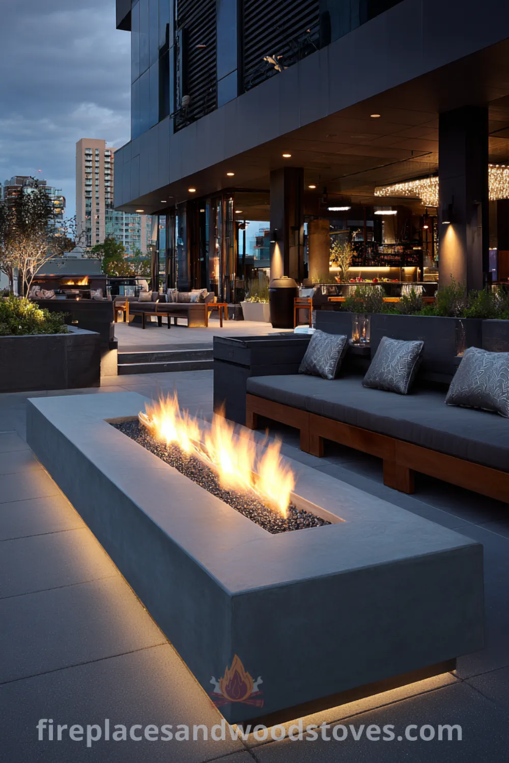 Urban rooftop with modern fire pit, integrated LED lighting, minimalist garden fire pit, and sleek concrete surface.