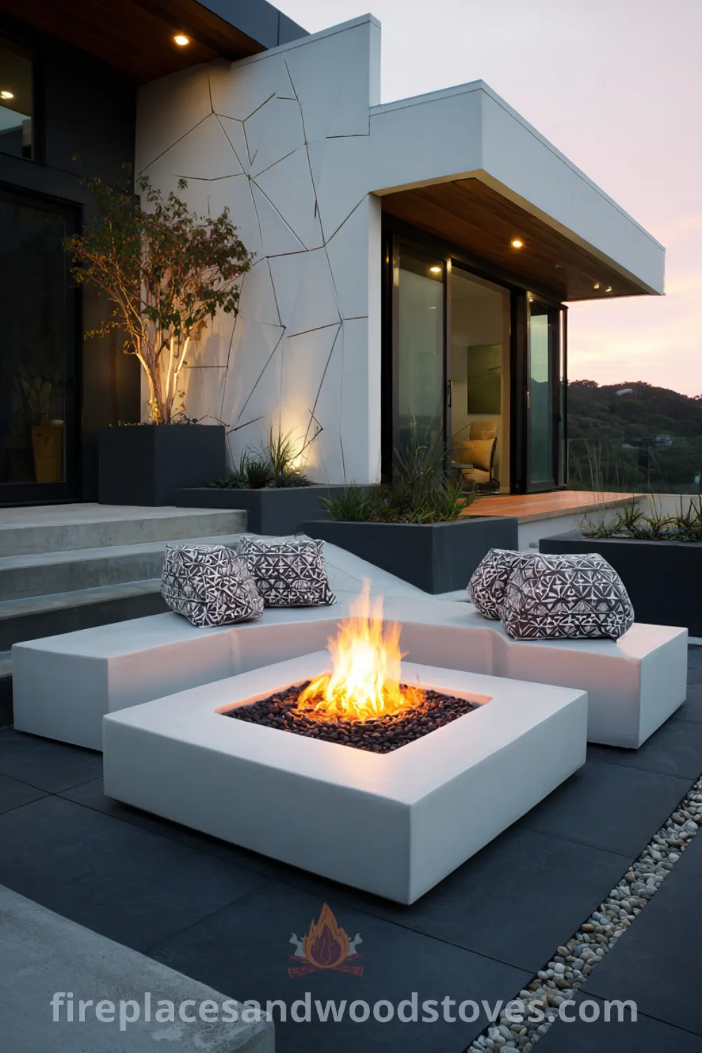 Minimalist fire pit made of smooth white concrete on a dark patio, featuring geometric seating, modern patio fire pit, and warm fire glow.