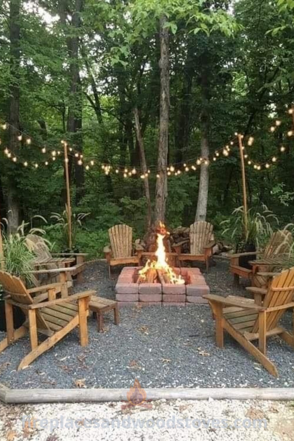 A cozy outdoor fire pit surrounded by wooden chairs and fairy lights, creating a picturesque landscaping design ideal for gatherings. Discover easy DIY landscaping ideas at patioandhomefurniture.com.