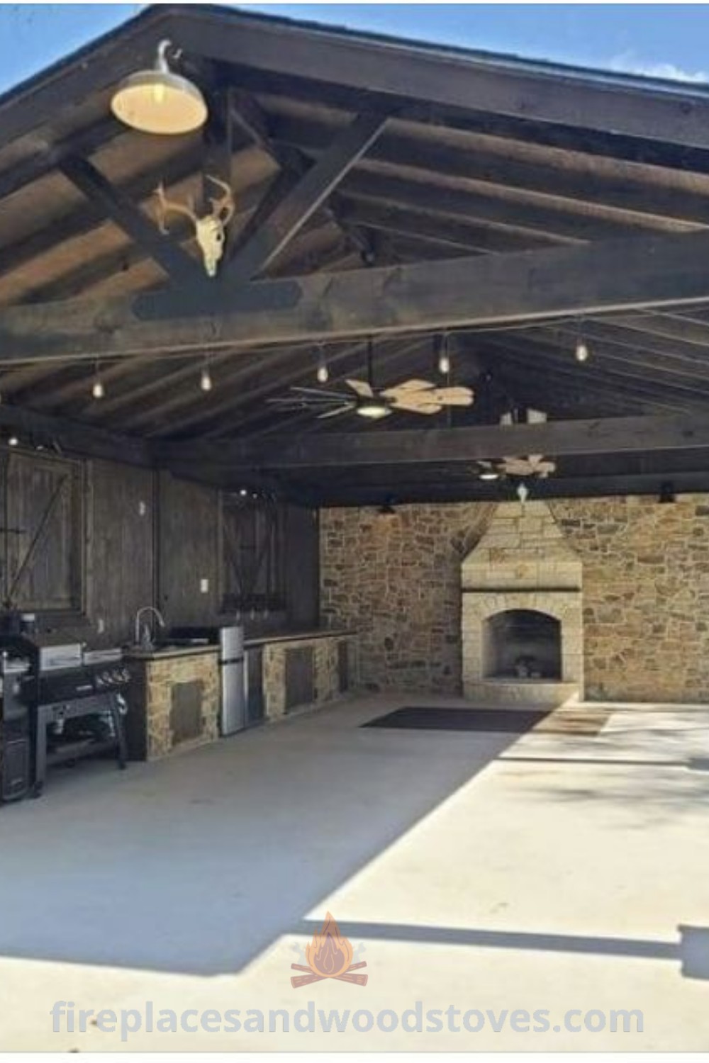 An outdoor BBQ kitchen with grills, cozy seating, and rustic bar design, perfect for creating a community outdoor kitchen. Explore stylish ideas that will wow your guests at patioandhomefurniture.com.