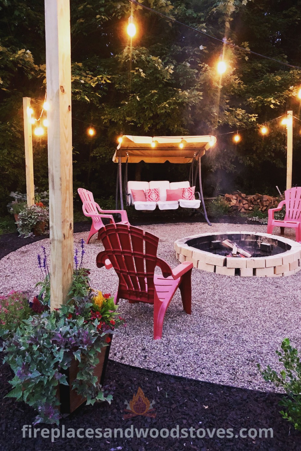 A cozy fire pit surrounded by lawn chairs and illuminated with string lights, creating an inviting outdoor space. Discover stylish DIY fire pit ideas that enhance your backyard setting at patioandhomefurniture.com.