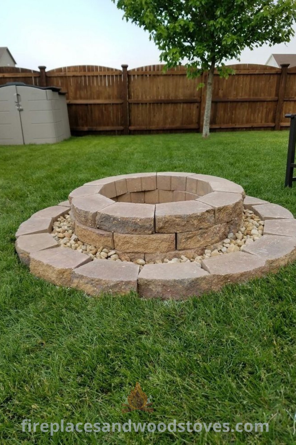 A stylish double fire pit in a grassy area, serving as a cozy centerpiece for outdoor gatherings. This is a renter-friendly fire pit idea, showcasing incredible designs transforming your backyard. Discover more fire pit inspirations at patioandhomefurniture.com.