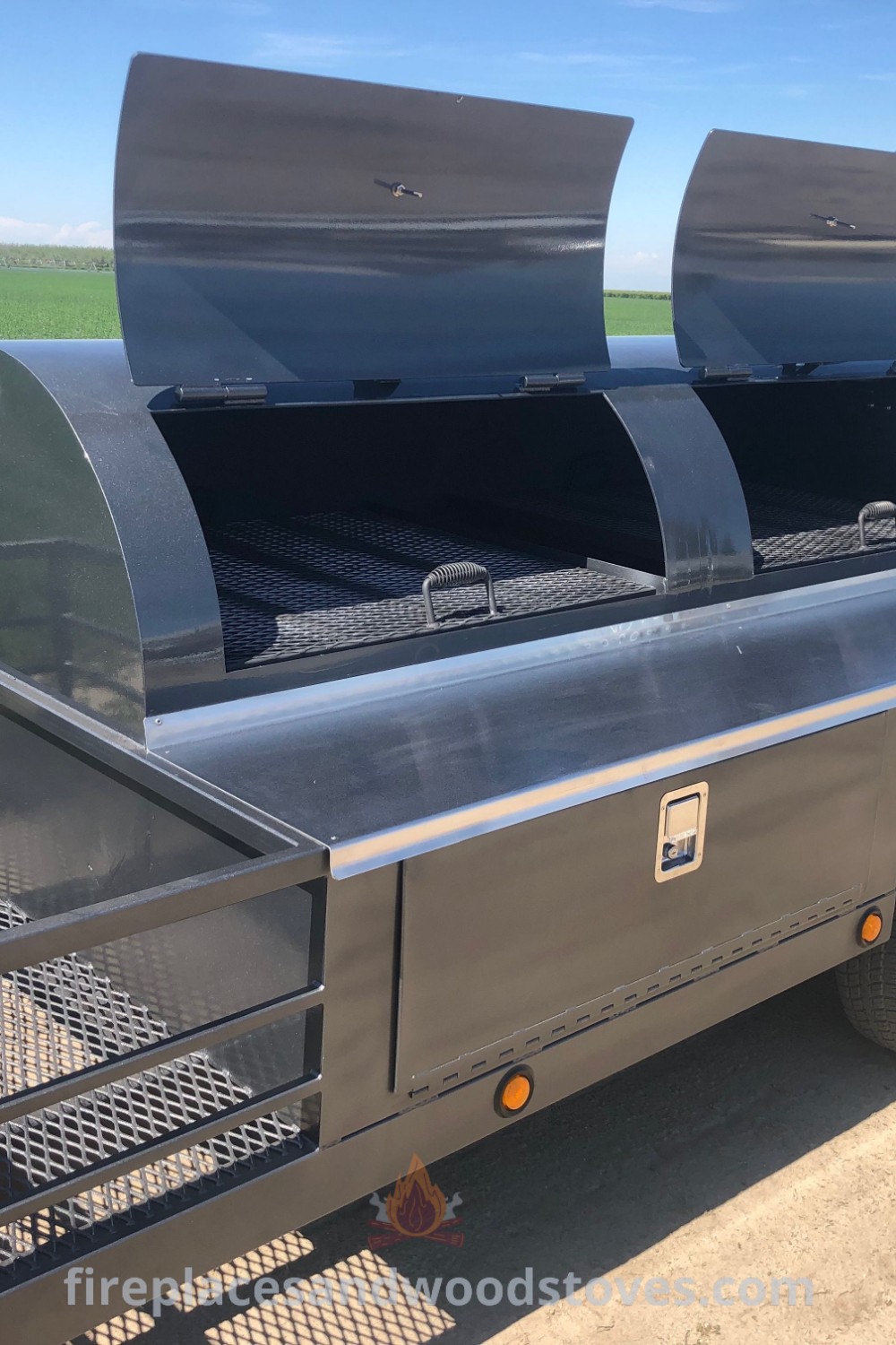 A custom BBQ trailer featuring a flatbed with large grills, showcasing stylish designs for outdoor cooking and entertaining. Discover unique BBQ trailer ideas and functionality at patioandhomefurniture.com.