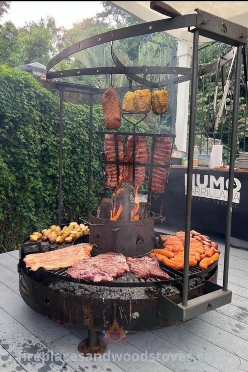 An outdoor cooking station featuring a grill with meat and vegetables, perfect for a stylish backyard grill setup. Transform your outdoor space into a cozy BBQ area with ideas you