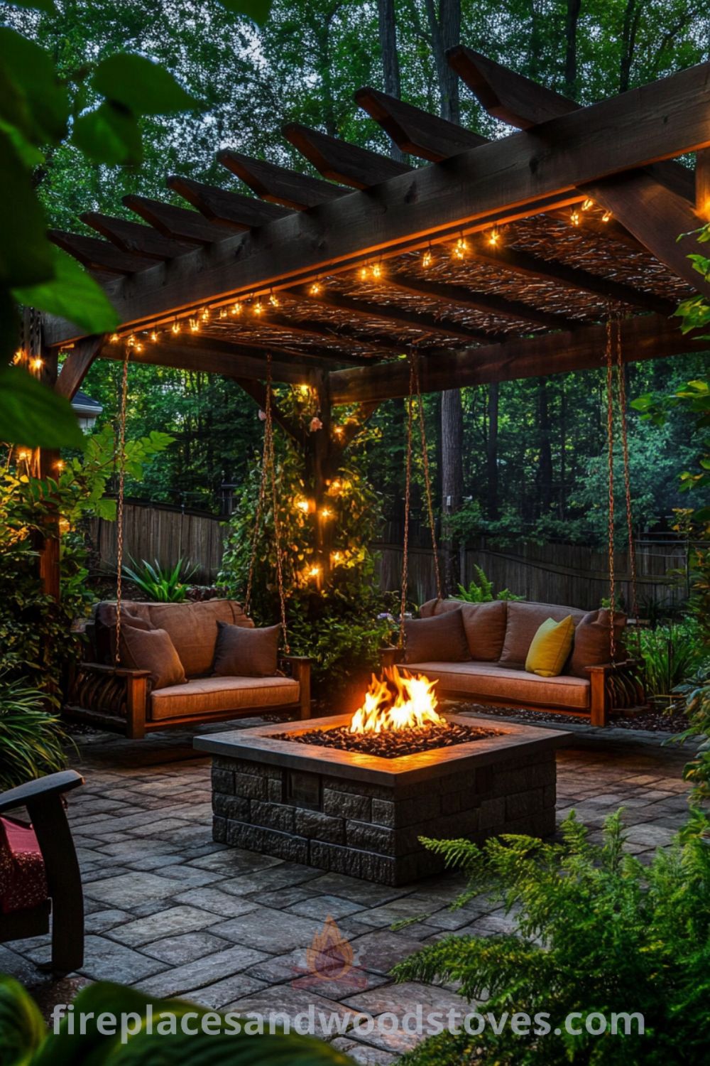 Charming backyard fire pit featuring sleek outdoor furniture and swings around fire pit on fireplacesandwoodstoves.com, perfect for outdoor living and cozy backyard design with fire pit ideas.