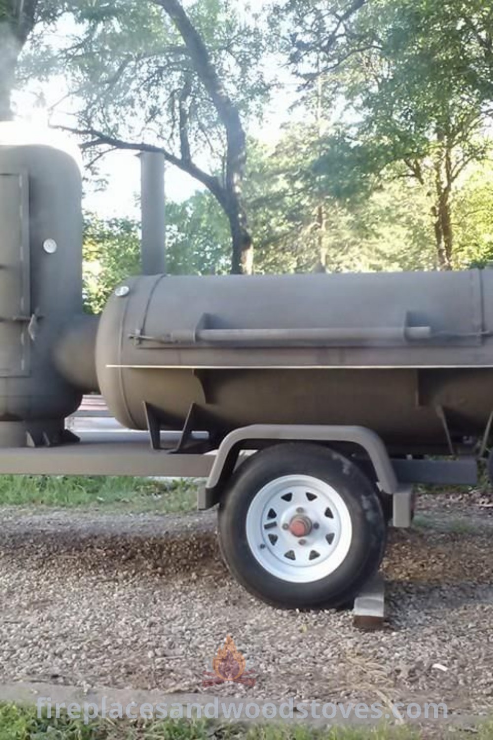 An outdoor BBQ grill on the back of a trailer showcasing a large smoker, perfect for backyard gatherings. This stylish unit offers incredible ideas for your outdoor cooking setup. Explore more designs and inspiration at patioandhomefurniture.com.